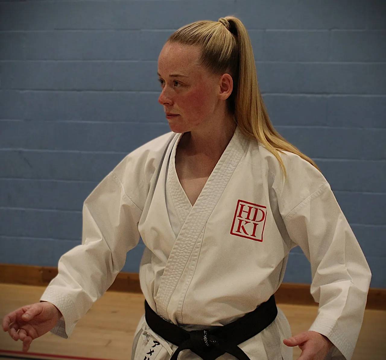 Young karate instructor training in HDKI gi